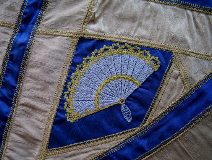 asian-fan-tassel-filled-redwork-embroidery